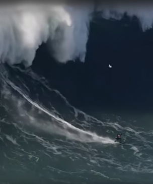 В Португалии серфер оседлал 30-метровую волну (видео)