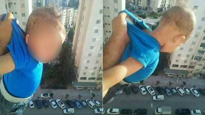 Мужчина вывесил ребенка из окна 15-го этажа! Мужчина вывесил ребенка из окна 15-го этажа!